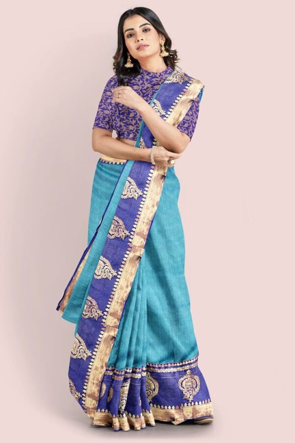 Sky Blue Soft Silk with Bootis Woven in Golden Jacquard Blue Anchal With Blouse